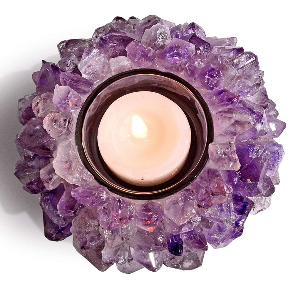 Natural amethyst cluster tealight candle holder on The Ultimate Witchy Gift Guide by Happy As Annie