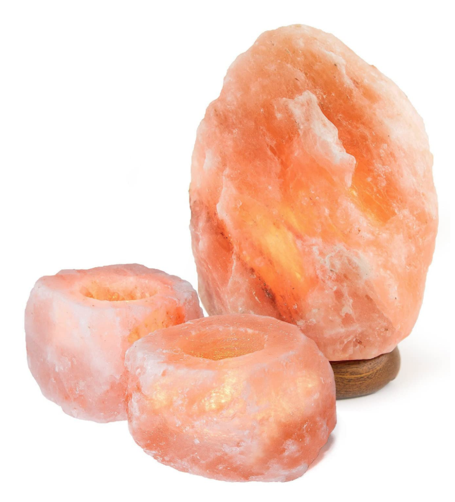 Himalayan salt lamp with salt candle holders on The Ultimate Witchy Gift Guide by Happy As Annie