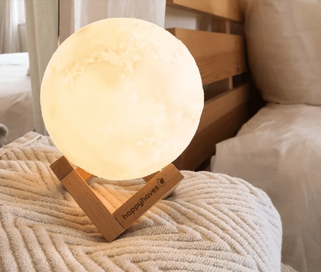 Light-up full moon essential oil diffuser on The Ultimate Witchy Gift Guide by Happy As Annie