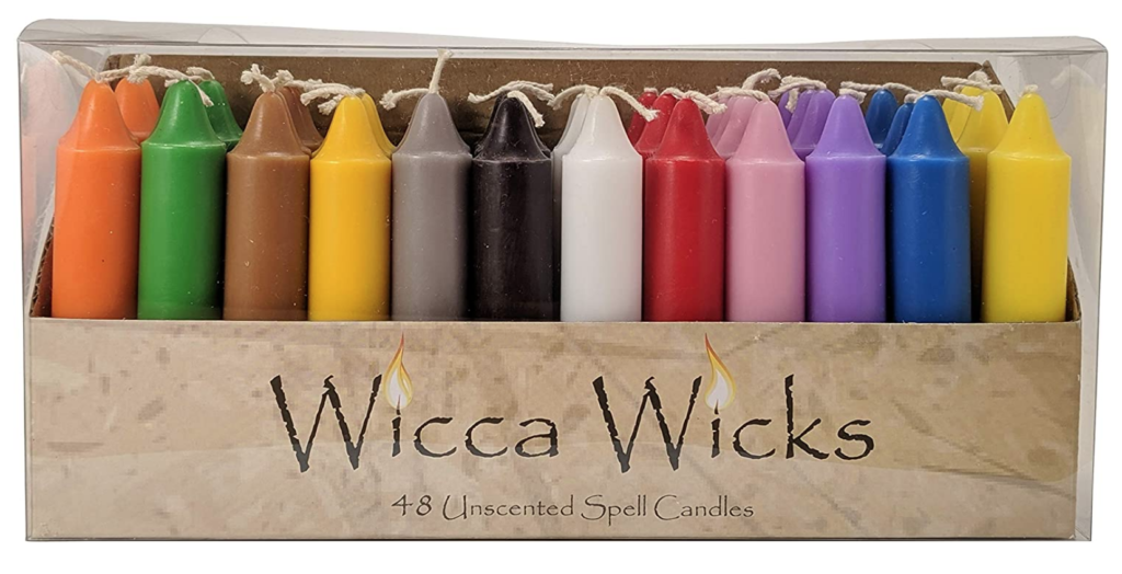 Box of 48 colored spell candles on The Ultimate Witchy Gift Guide by Happy As Annie