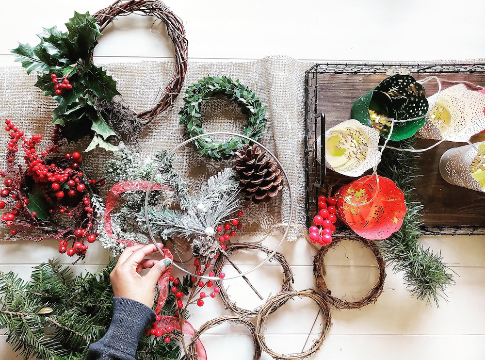 Make an Evergreen and Holly Wreath for Winter Solstice and Yule | 9 Ways to Celebrate the Winter Solstice by Happy As Annie