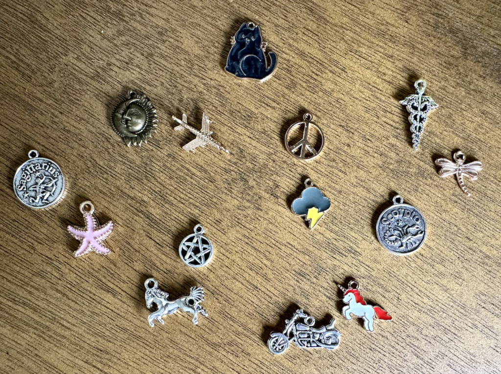Charm casting or divination charms available in Within Charm's Reach, charm shop on Etsy, including astrology charms, tarot charms, and more